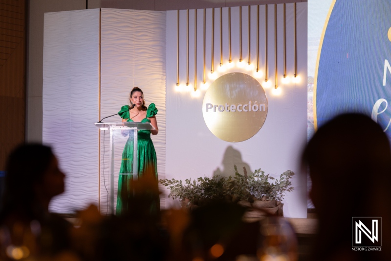 Corporate event in Curacao features a speaker discussing protection
