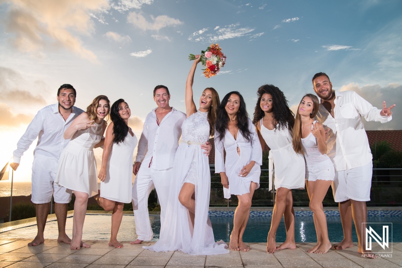 Bridal party at pool with sunset