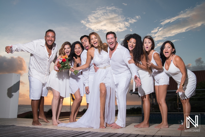 Bridal party at pool with sunset