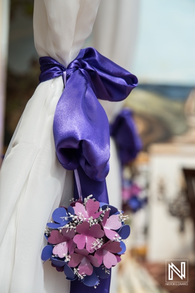 Purple wedding decoration ribbon and flowers