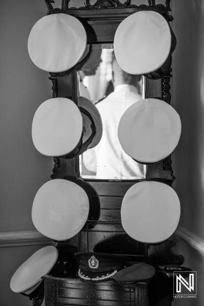 Military sailor hats on mirror