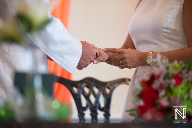 Bride and Groom holding hands together