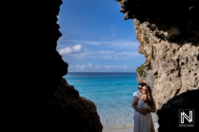 Couple enjoys trash the dress photoshoot at Cas Abao Beach near the water