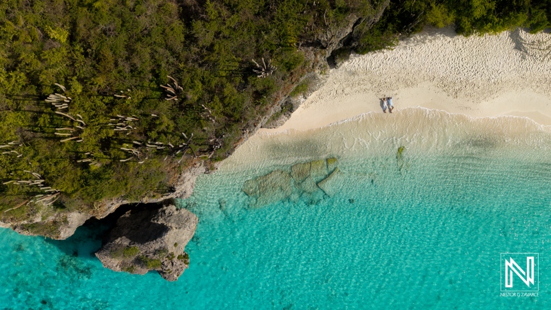 Trash the dress photoshoot at Cas Abao Beach in Curacao captures joyful moments on the sand