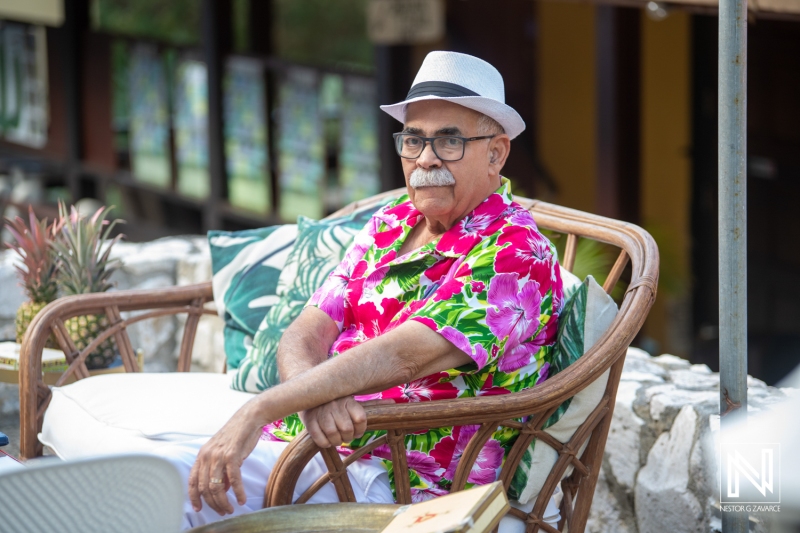 Celebrating a joyful birthday in Curacao with vibrant colors and stylish tropical attire