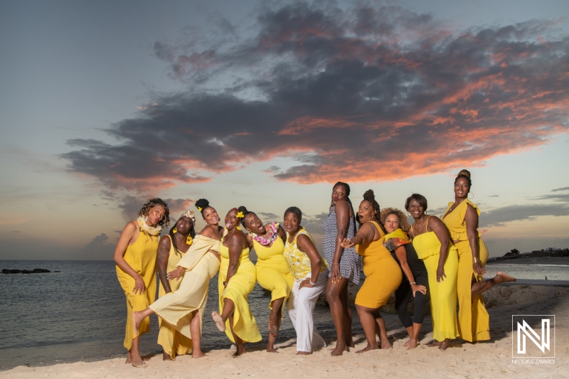 Celebrating a joyful birthday gathering on the beautiful shores of Curacao at sunset