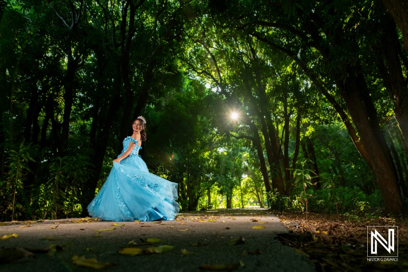 Celebrating a beautiful birthday in Curacao with a princess-themed photoshoot surrounded by lush greenery and sunlight