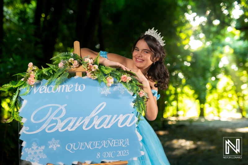 Celebrating Barbara's Quinceanera in Curacao with a Tropical Backdrop and Elegant Decorations