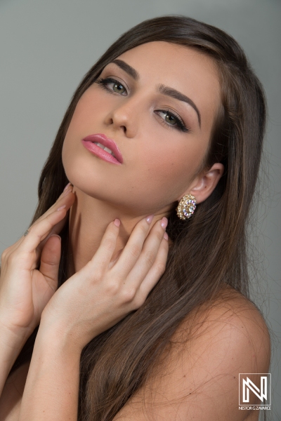 Captivating beauty captures attention in a commercial setting in Curacao during a fashion shoot for an elegant brand showcasing exquisite jewelry