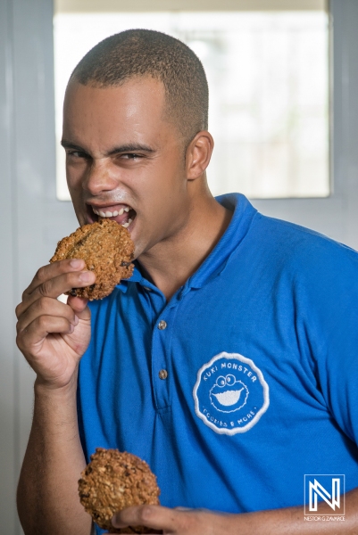 Delicious cookie tasting experience in Curacao featuring a young man enjoying baked treats with enthusiasm