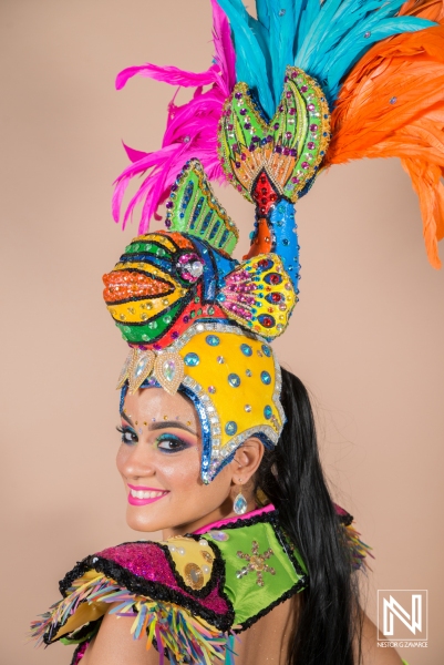 Vibrant carnival dancer in colorful headdress showcasing traditional costume in Curacao during cultural festival