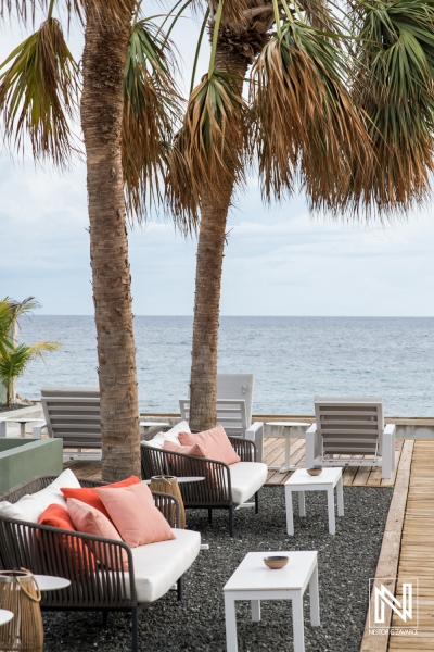 Relaxation by the Sea in Curacao with Stylish Seating and Ocean View