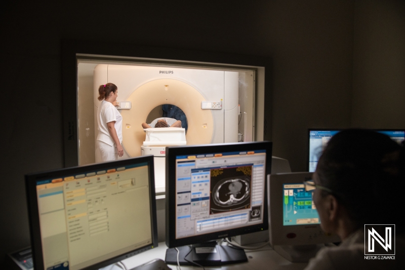 Medical professionals operate advanced imaging technology in Curacao for patient diagnosis