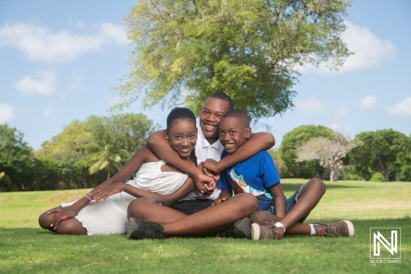 Children enjoying a sunny day outdoors in Curacao, embracing friendship and joy in a lively setting