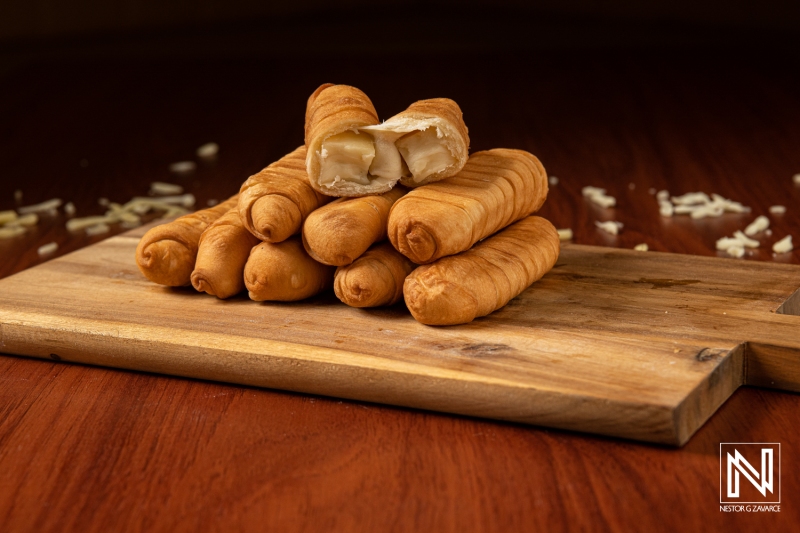 Delightful Curacao pastries served on a wooden board showcasing rich flavors and textures