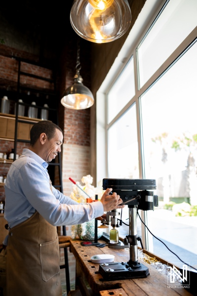 Branding photography for ParfumLab in Curacao featuring a person working in a studio