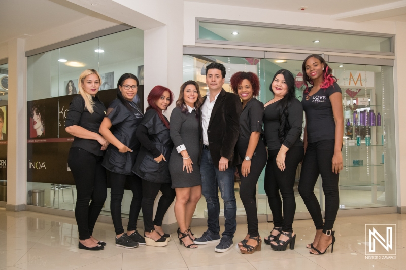 A Group of Professional Hairstylists Poses Together in a Salon, Showcasing Their Skills and Teamwork in a Vibrant Urban Setting During the Daytime