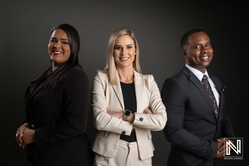 A Diverse Group of Professional Individuals Posing Confidently Against a Dark Backdrop in a Business Setting, Showcasing Teamwork and Collaboration in Their Careers