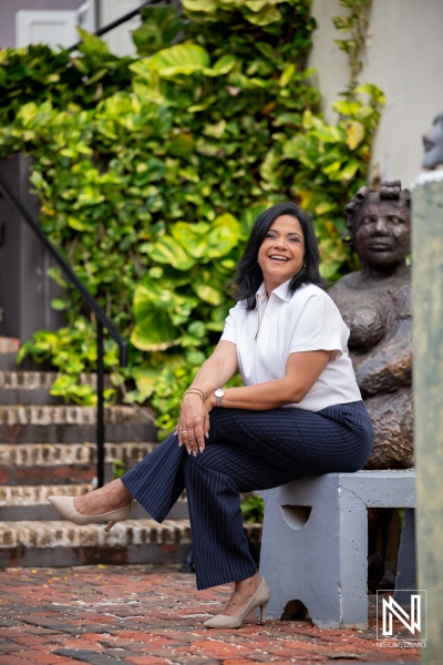 Corporate headshot taken in Curacao with natural surroundings and greenery