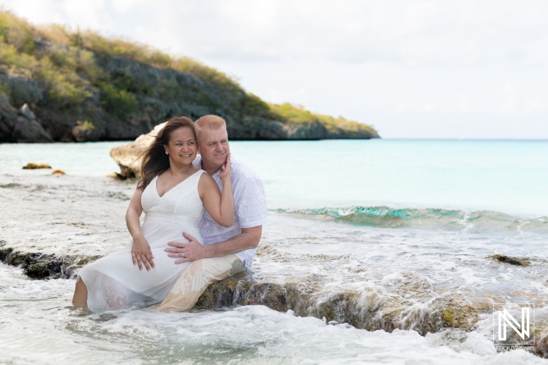 Couple enjoys intimate moment at sunrise on Cas Abao Beach in Curacao