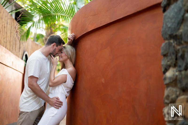 Couple enjoying intimate moment at Baoase Luxury Resort in Curacao surrounded by lush nature