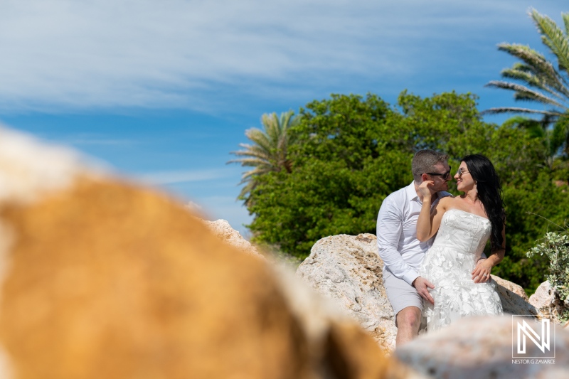 Couple enjoying a romantic moment at Baoase Luxury Resort in Curacao amidst beautiful tropical scenery