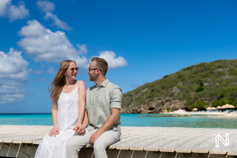 Couple enjoying a romantic moment at Playa Porto Mari in Curacao with stunning ocean views