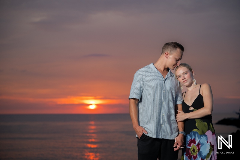 Couple enjoys photoshoot session at Baoase Luxury Resort during sunset in Curacao
