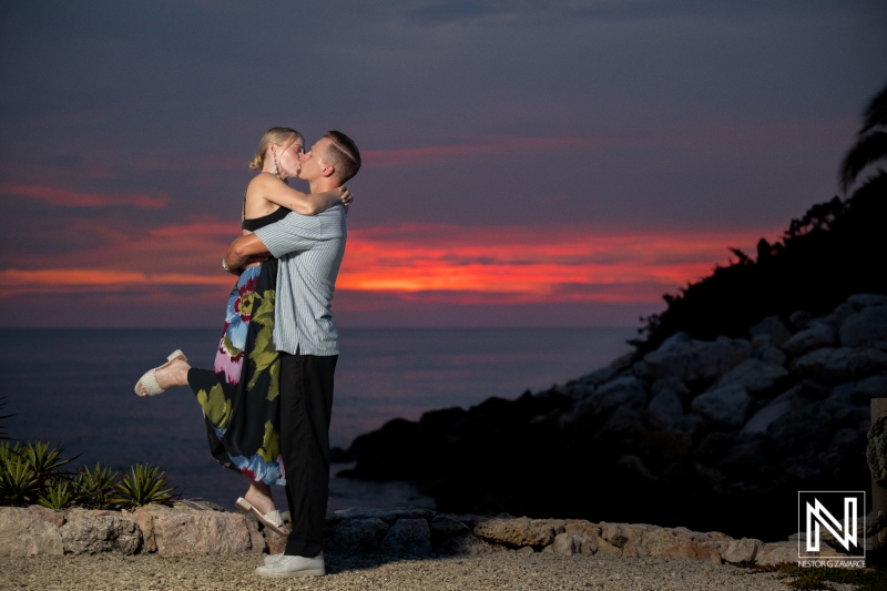 Couple enjoys photoshoot at Baoase Luxury Resort during sunset in Curacao