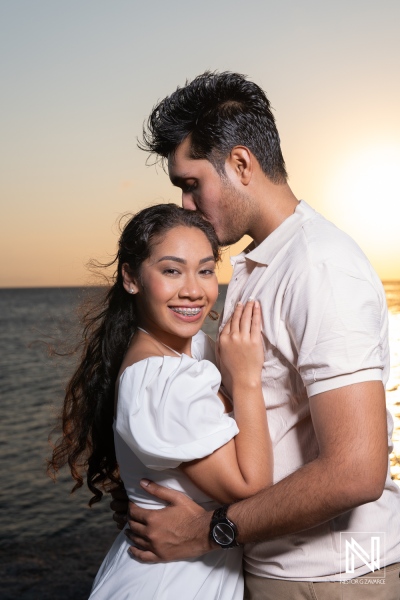 Engagement session at St. Michiel during sunset in Curacao captures couple's love and joy by the water