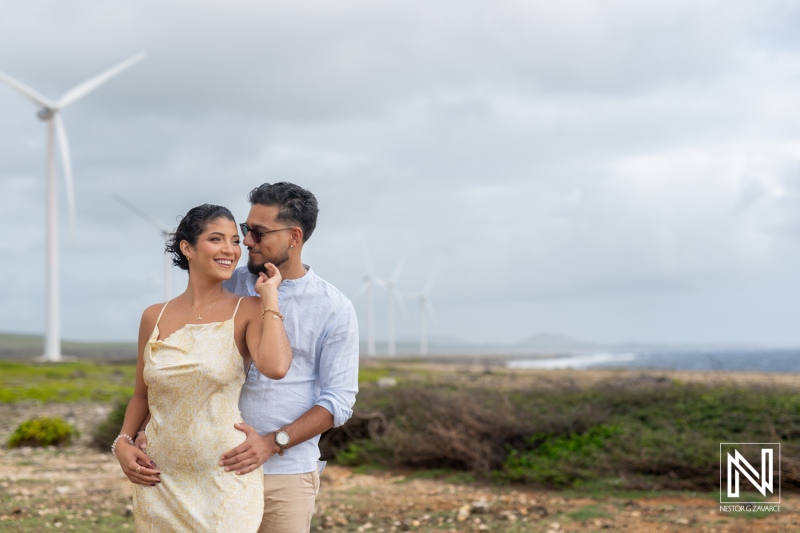 Couple enjoys romantic engagement session at Vlakte di San Pedro, Curacao on a breezy day