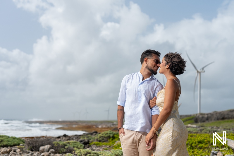 Engagement session at Vlakte di San Pedro in Curacao featuring a couple enjoying romantic moments by the ocean
