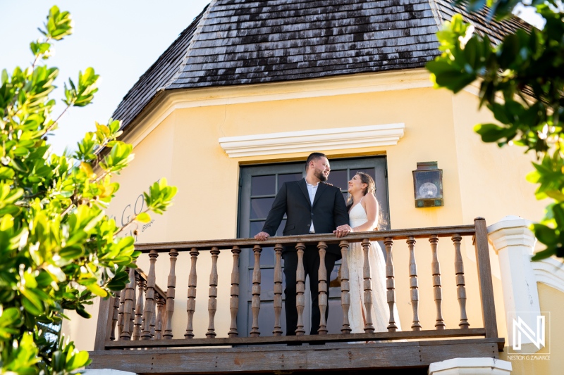 Engagement celebration on a charming balcony in Curacao with a picturesque backdrop