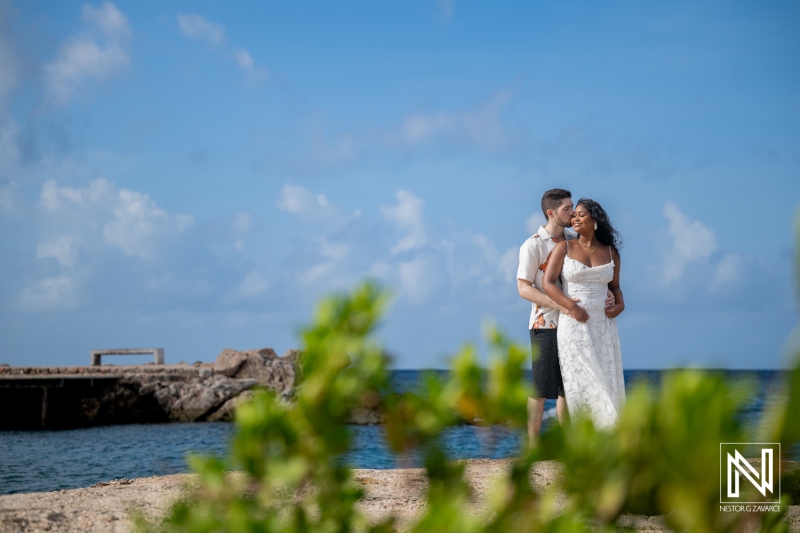 Couple enjoys engagement session at Marie Pampoen in Curacao during sunny day