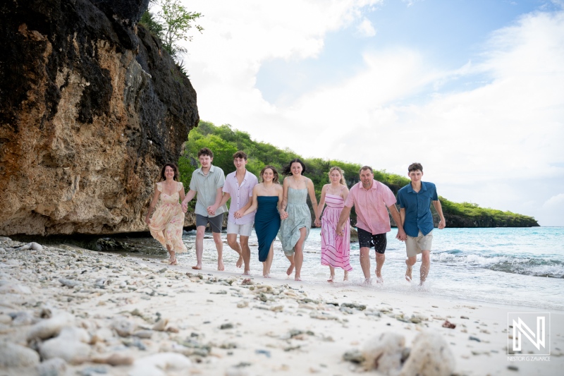 Family and friends enjoying a fun day at the beach during a photoshoot in Curacao