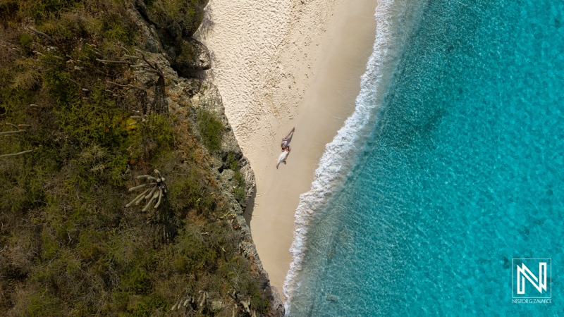 Trash the dress session at Cas Abao Beach in Curacao captures unique moments in clear water