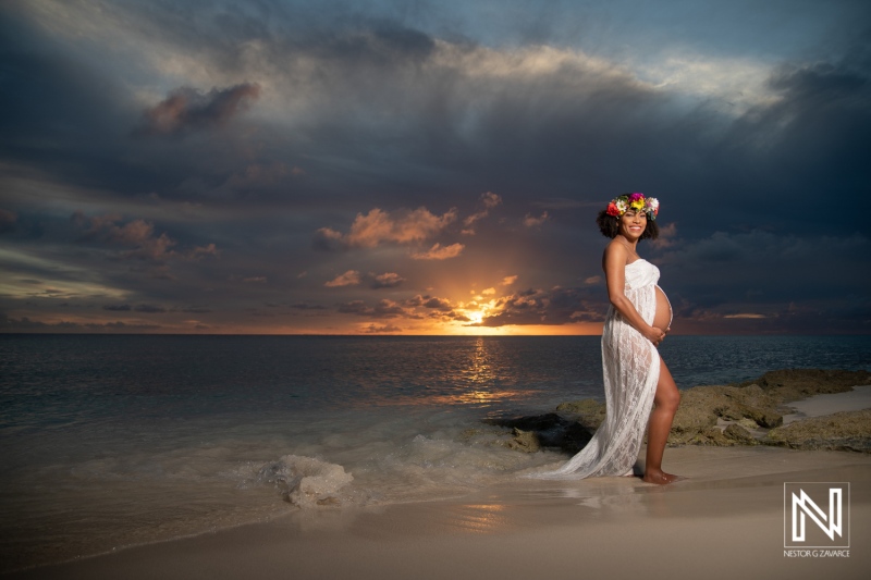 Expecting joy under the sunset sky in Curacao, celebrating maternity and the beauty of pregnancy