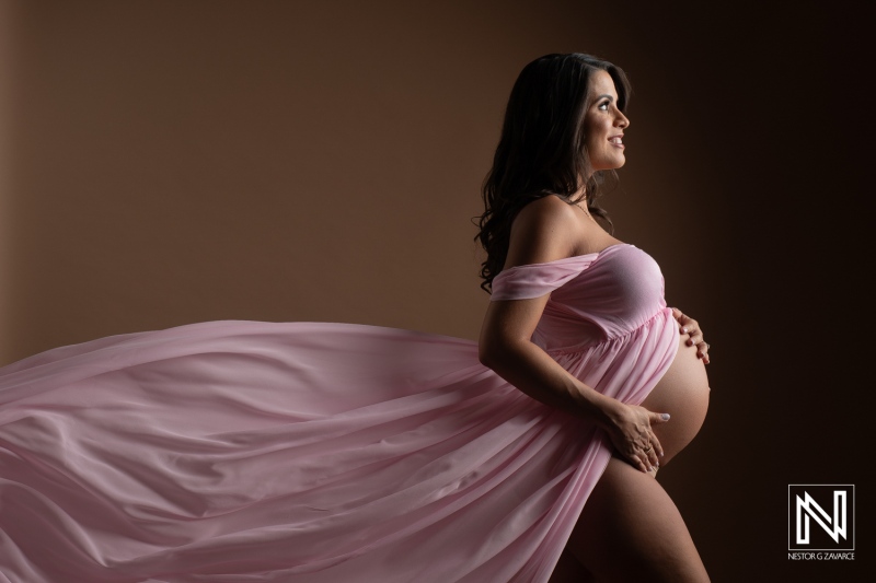 Expecting a child in Curacao with elegance during a serene maternity photoshoot