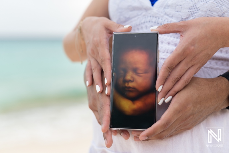 Expecting parents showcase their joy in a stunning maternity photoshoot on the beautiful beaches of Curacao, highlighting their love and anticipation for their newborn