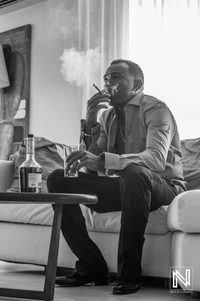 Groom smoking cigar