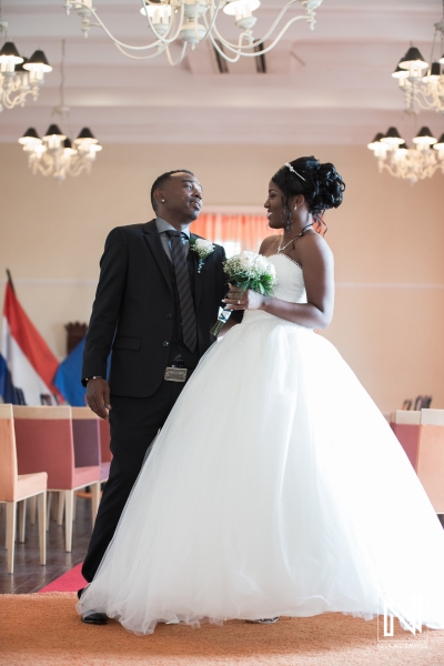 Bride and groom looking each other