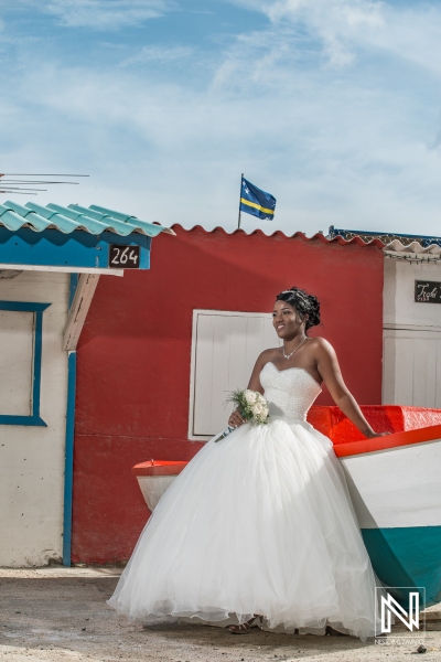 Bride next to Curacao fisherman boat