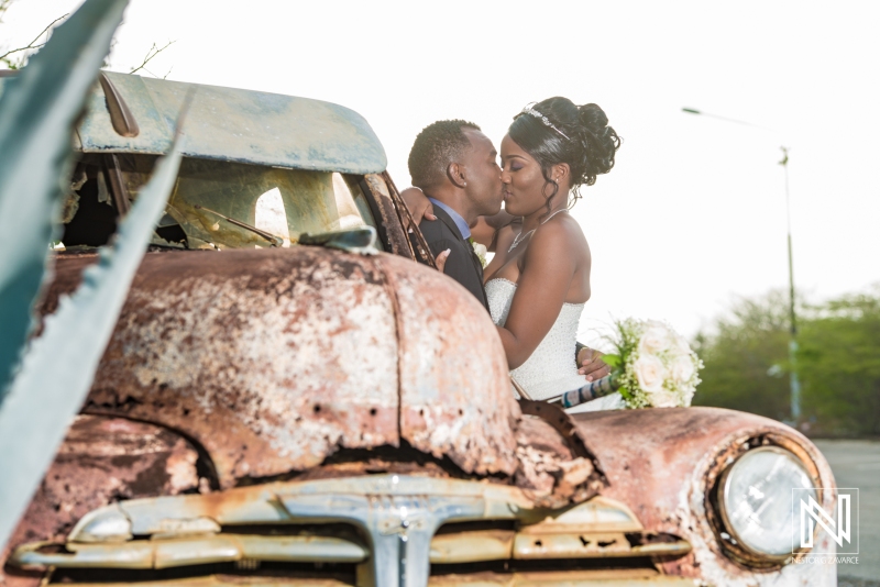 Bride and groom with old classic car photoshoot