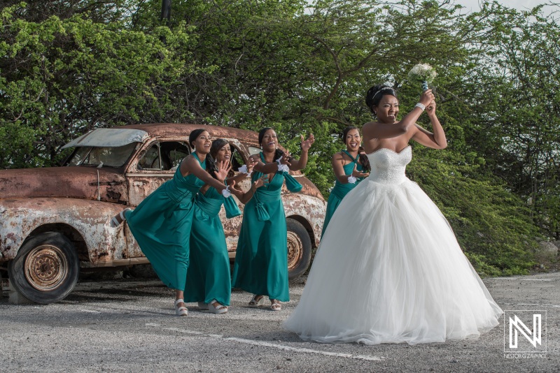 Bride trowing bouquet to bridemaids