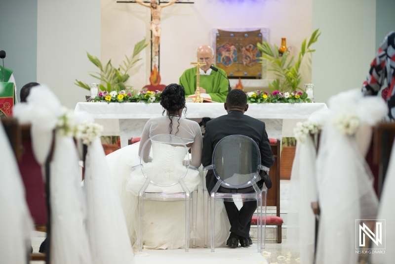 Bride and groom sitting in the church ceremony