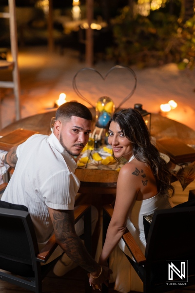 Couple shares a special moment during wedding proposal at Baoase Luxury Resort in Curacao on a warm evening