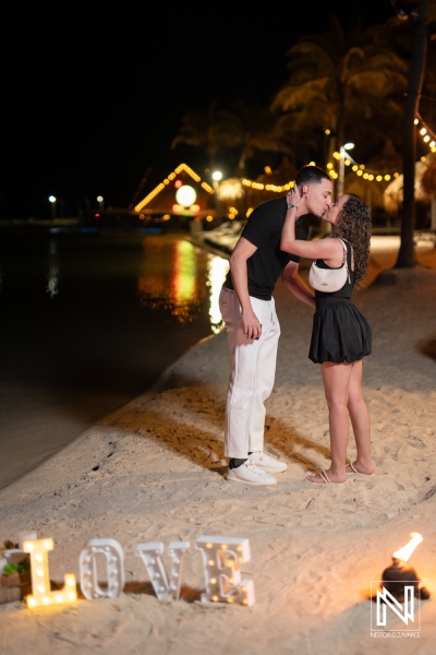 Couple shares a special moment during a wedding proposal at Renaissance Wind Creek Curacao Resort