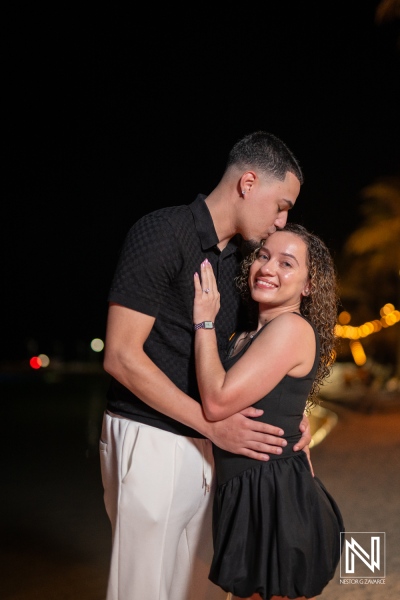 Wedding proposal at Renaissance Wind Creek Curacao Resort under night sky
