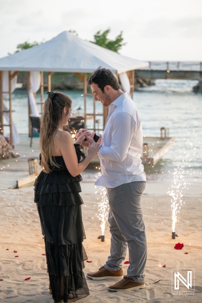 Couple exchanges rings during wedding proposal at Baoase Luxury Resort in Curacao