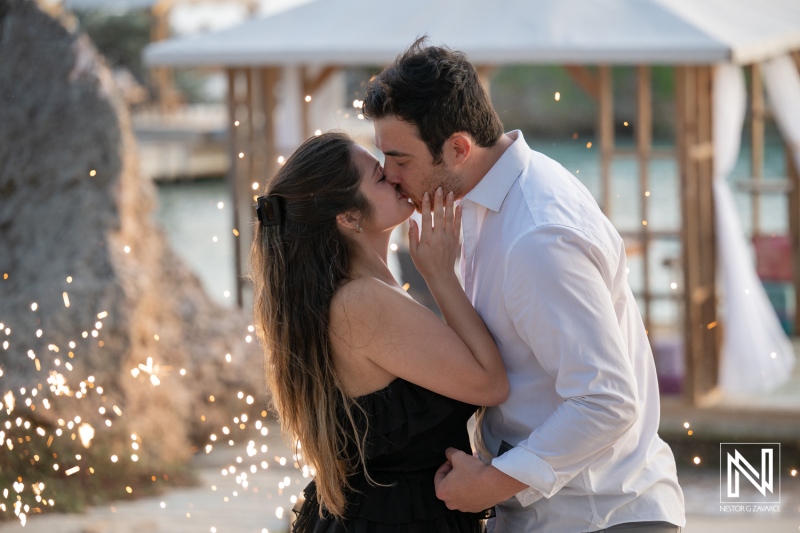 Couple shares a kiss during a wedding proposal at Baoase Luxury Resort in Curacao